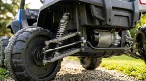 Detailed view of the shock-absorbing suspension system on a 24V ride-on toy for 5-year-olds.
