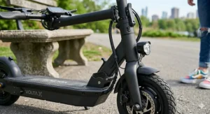 Close-up of a modern matte black electric scooter designed with a sturdy frame for teens and young adults.