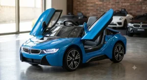 Blue BMW i8 ride-on car showing open signature butterfly doors and LED headlights.