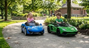 Two children racing mini luxury ride on supercars along a sunny park pathway.
