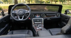 Realistic toy dashboard with MP3 player and steering wheel inside a 2 seater luxury ride on car for toddlers