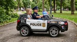 Side view of a 2-seater police car ride on toy showing glowing emergency light bars, realistic siren, and rubber traction tires