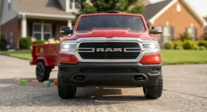 Illustration highlighting the working LED headlights on the front grille of the Ram truck ride on toy.