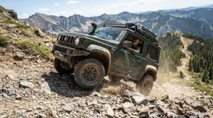 An off-road electric vehicle for teenagers conquering a steep rocky hill during a weekend adventure.