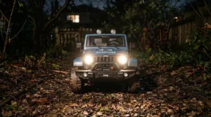 An off-road ride-on car for preteens driving with illuminated headlights in the evening.