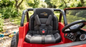 Close-up of a secure safety harness on a ride-on car for preschooler with disability during outdoor play.