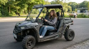 Maximum weight capacity demonstrated in a ride-on car for tall 12 year old on asphalt