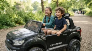 Children testing a sturdy two-seater ride-on car for siblings with a high shared weight capacity.