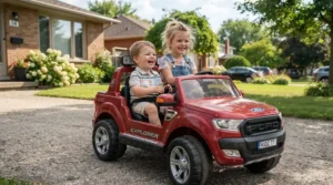 A side by side electric ride on car for siblings parked safely on a suburban driveway during a sunny afternoon.